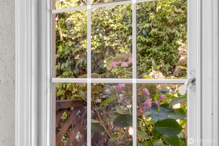 Beautiful leaded windows highlight the historic character of this Tudor gem