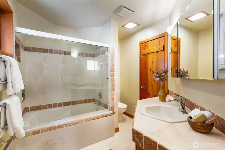 2nd bathroom features a large soaking tub.
