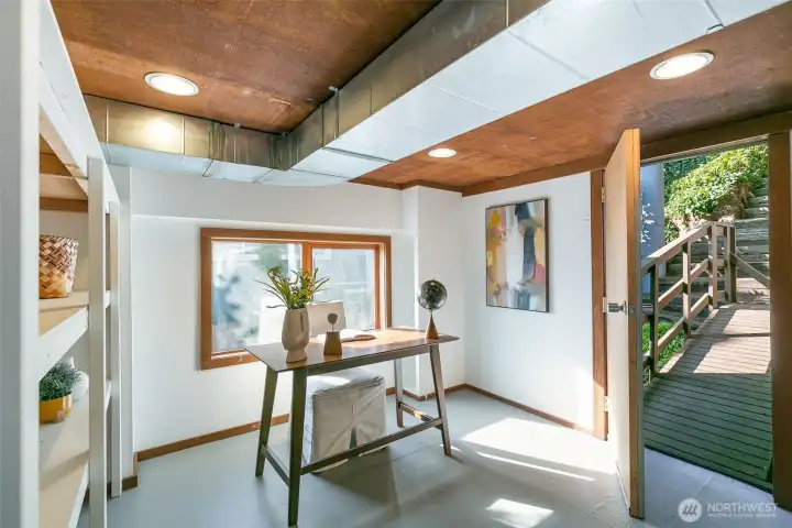 Extra unfinished space offers storage or separate work from home space.