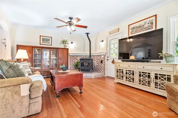 Love the brick surround w/the efficient & cozy pellet fireplace