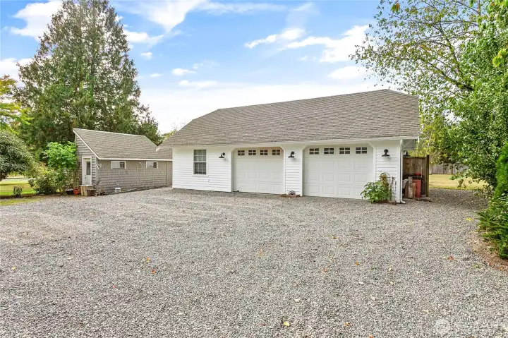 Roof was done on garage, green house & home all at the same time. Nice detached 2 car garage w/separately accessed flex room on left