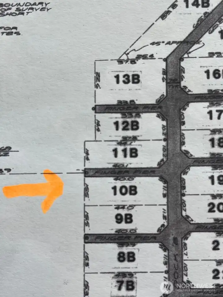 44’ slip with 15.5’ entrance, 11.3’ dock span, and approx. 10’ depth at low tide.