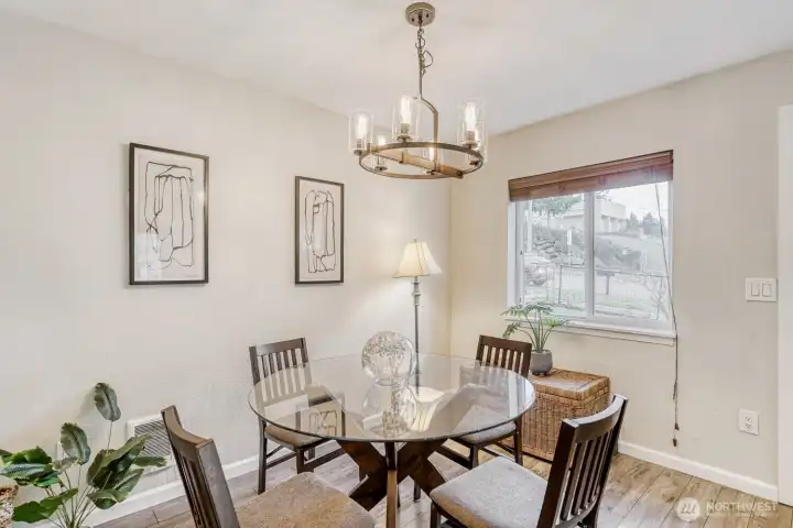 Generous dining space with updated lighting.