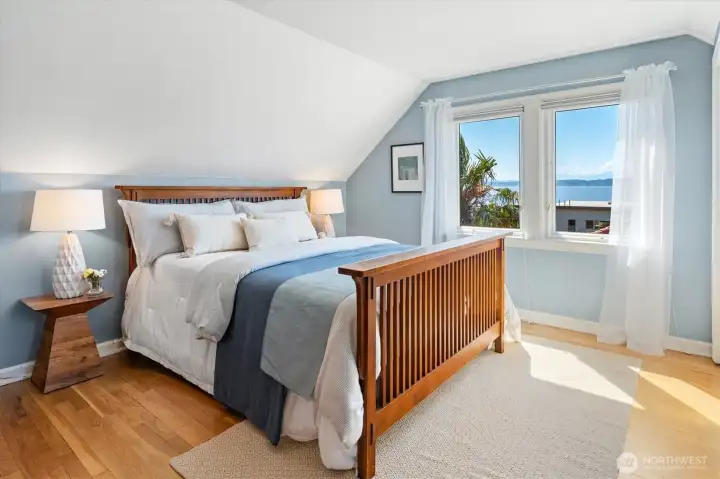 Large primary bedroom with some amazing views