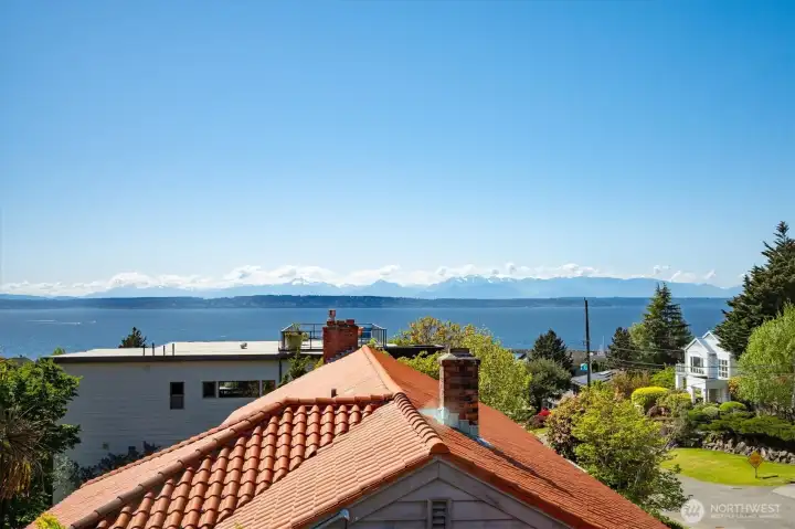 Awake to views like this from the primary bedroom.