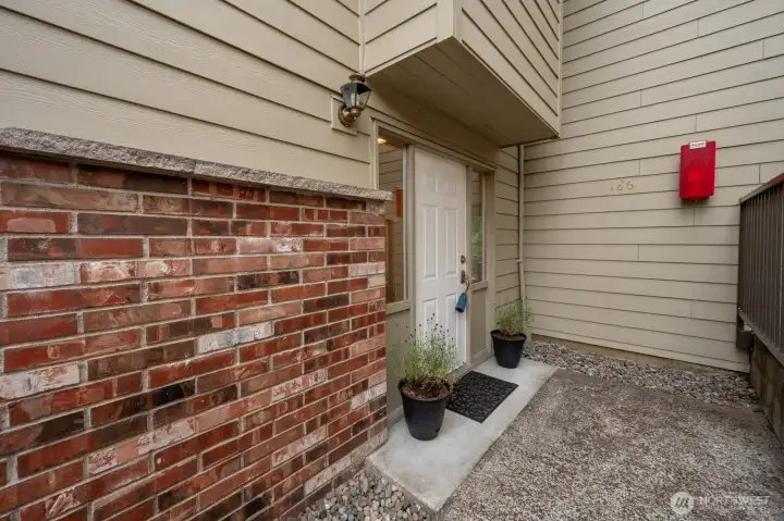 Only four steps down from the parking lot to get to your front door.