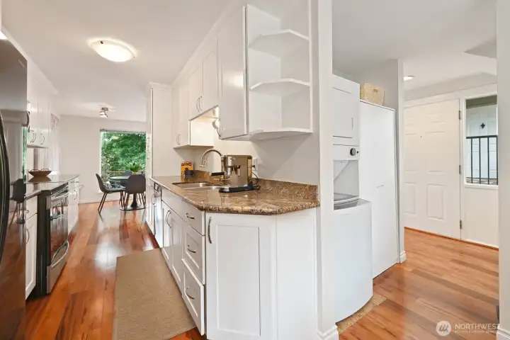The kitchen connects to both the dining room and the living room for an open feeling throughout.
