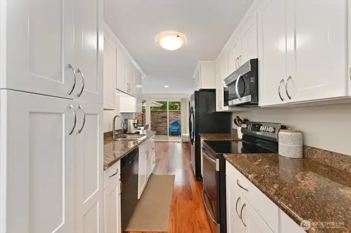 Clean lines and neutral white cabinets.