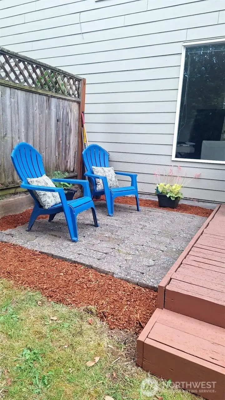 Deck with pavers for more chairs or potted plants.