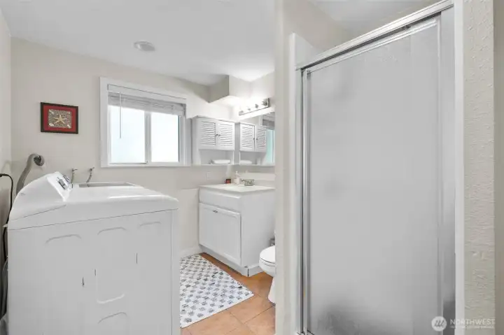 Lower Floor 3 quarter Bathroom with washer and dryer