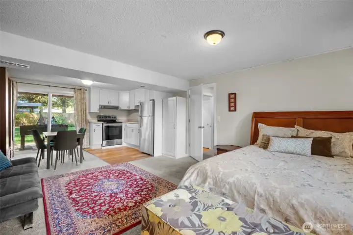 Basement Kitchen, Dining, living and bedroom Area as an open concept.