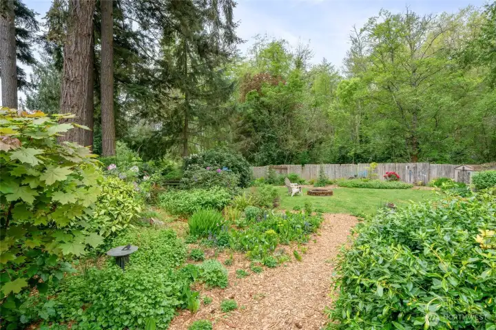 Over 1/2 ACRE of private oasis
