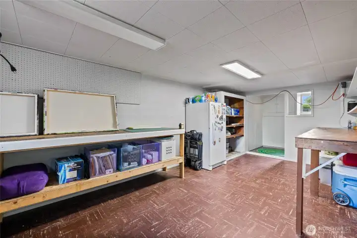 Basement workspace and tons of built in storage, room to add wine cellar