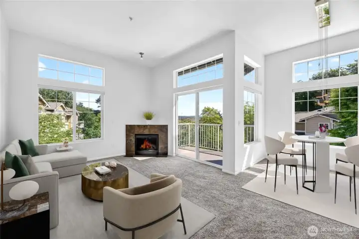 Look at the walls of windows. This home is full of light. Virtually staged.