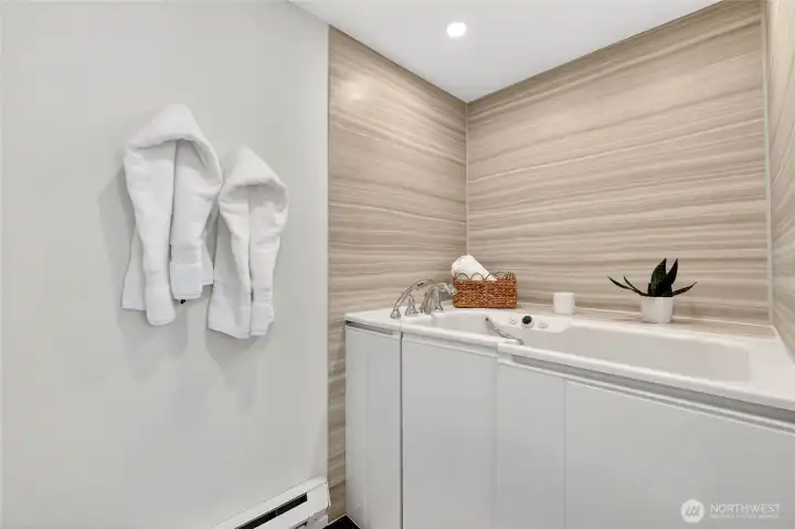 This soaking tub is amazing. Like a hot tub in your home!