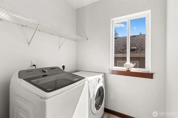 upstairs dedicated laundry room