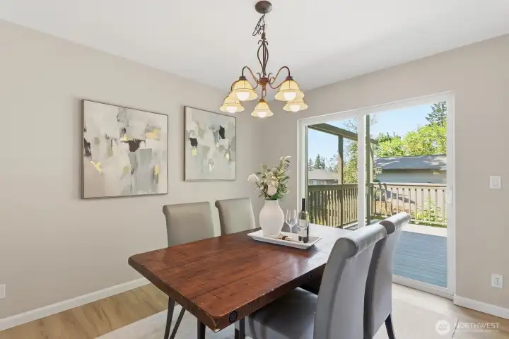 A slider out to the deck makes for seamless indoor-outdoor living and BBQing.