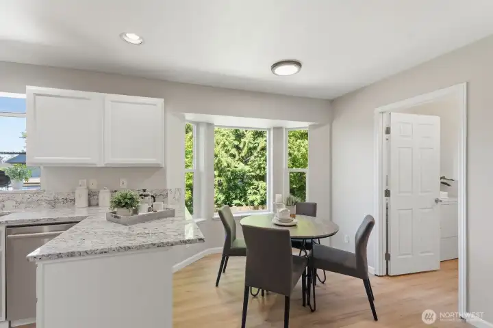 This sweet breakfast nook with a bay window is great for quiet nights at home and leisurely weekend brunches.