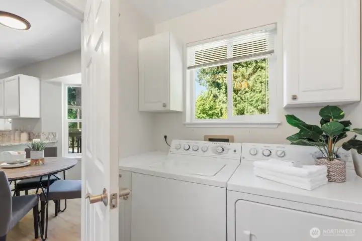 Doing laundry will feel like less of a chore when you get to look outside to these peaceful green views!