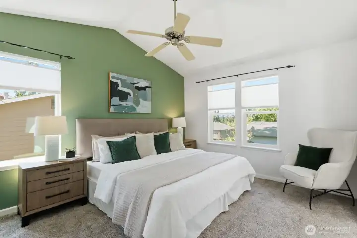 Head upstairs to check out all three bedrooms, including this bright and airy primary.