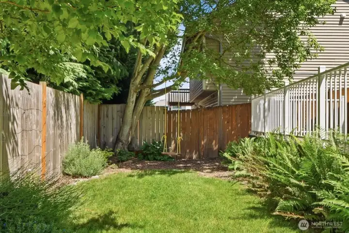 The yard is fully fenced, too - great for pets, security, and play.