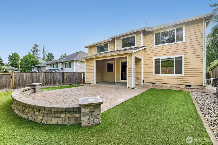 Ultra-low maintenance back yard with hardscape.