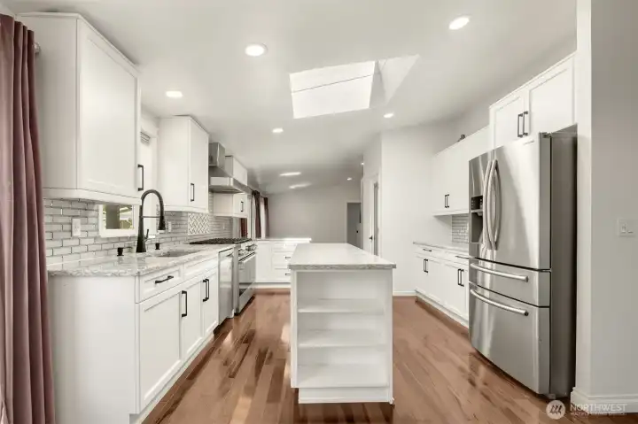Massive Island with Built-In Shelving