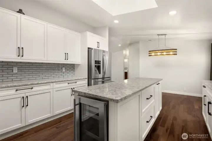 Beautiful Quartz Counters, Plenty of Counter Space and Custom-Style Shaker Cabinetry with Modern Hardware