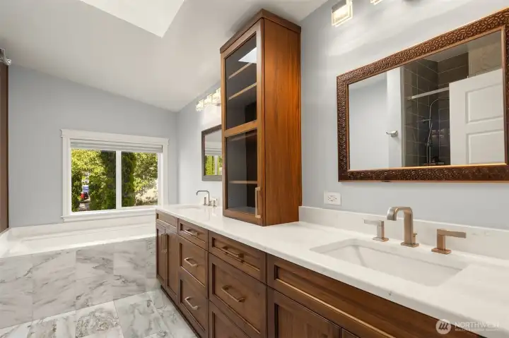 Custom Spa-Like 5-Piece Primary Bath with Marble Floors, Dual Vanities, & Stunning Wood Cabinetry