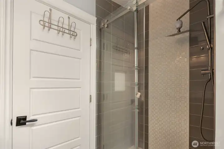 Beautifully Tiled Walk-In Shower with Adjustable Rain Shower Head