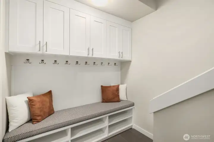 Lower level mudroom, just off the garage, with lots of storage - a lovely upgrade that the owners added