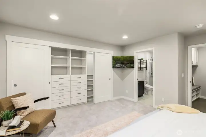 Upgraded closet system includes drawer and hanging space and automatic lighting. All the bells and whistles!