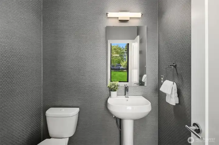 Main floor half bath just off the entryway