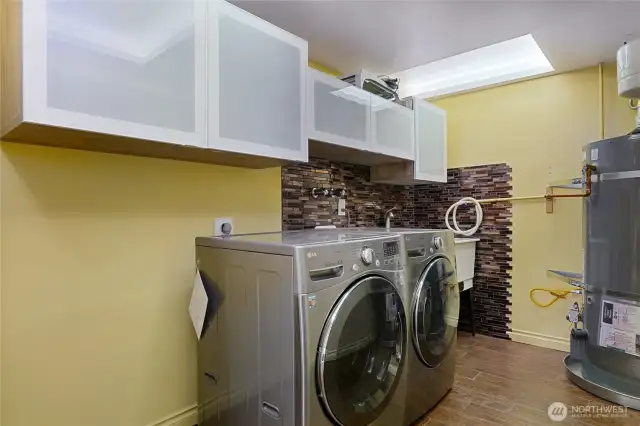 Lower level utility room with stainless washer and Dryer included