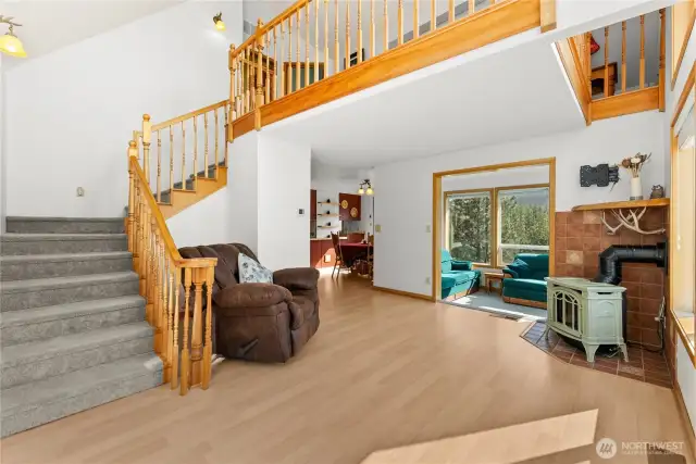Staircase leads to 2 bedrooms and loft
