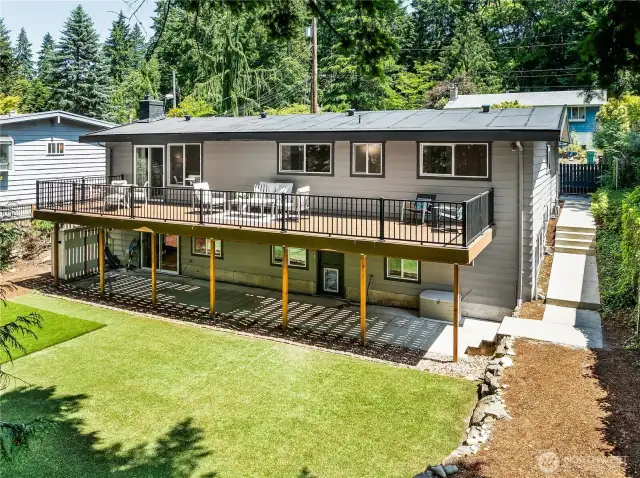 Look at all the space! In addition to a new roof, the home features updated, high-quality Milgard windows throughout, enhancing energy efficiency and reducing interior noise.