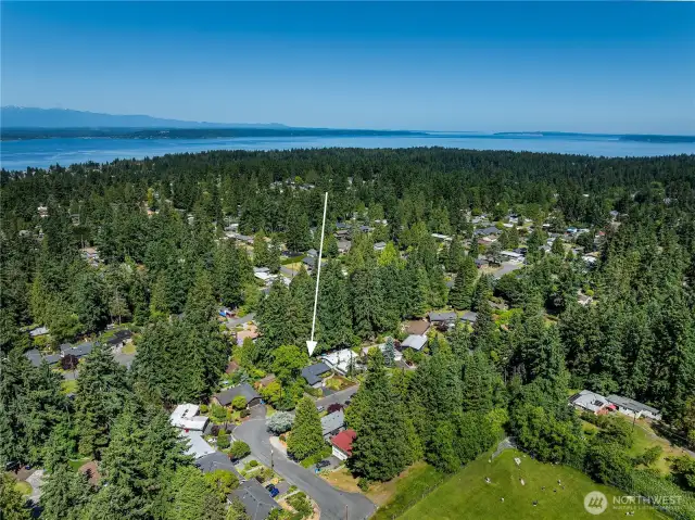 Aerial view looking NW. Puget Sound and Whidbey Island are in the distance.