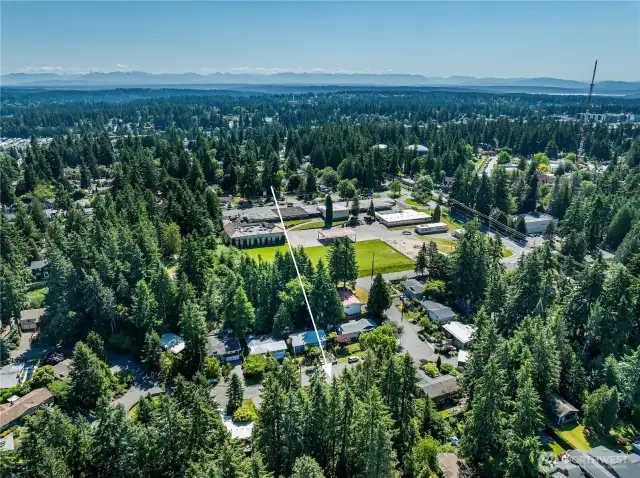 Aerial view looking East. King's Elementary School is in the middle ground and the Cascade Mountains are in the distance.