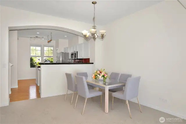 Virtually staged spacious dining area.