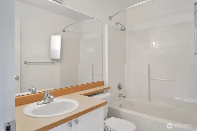 secondary bedroom with its own full bath