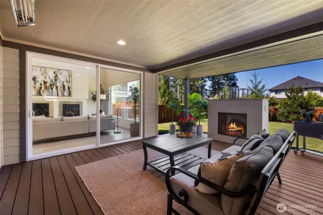 Your dream covered outdoor space With trex decking, built in outdoor heaters for year round use, gas fireplace , Plumed for full outdoor kitchen install, hot tub with motorized cover. This is a year round vacation space!