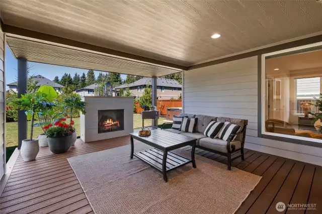 Your dream covered outdoor space With trex decking, built in outdoor heaters for year round use, gas fireplace , Plumed for full outdoor kitchen install, hot tub with motorized cover. This is a year round vacation space!