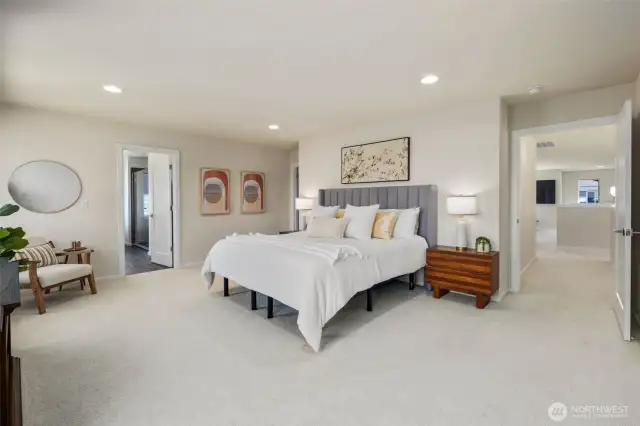 Exceptionally appointed primary suite with oversized spa like bathroom, dual shower heads, designer walk in closets with LED lights