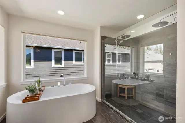 Luxury spa like bathroom, dual vanity, floor to ceiling shower tiles, dual shower heads,