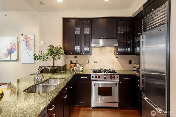 Gas cooking (this home has a gas fireplace as well!) and luxury appliances.