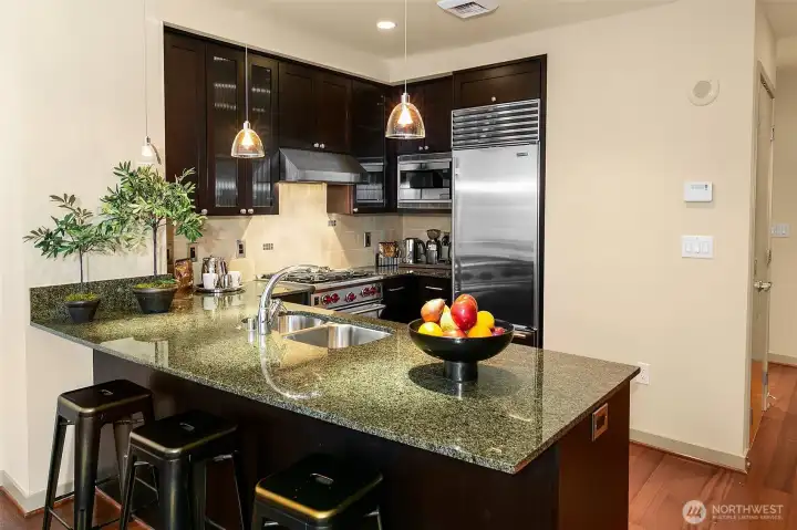 Large level peninsula/bar is perfect for entertaining.