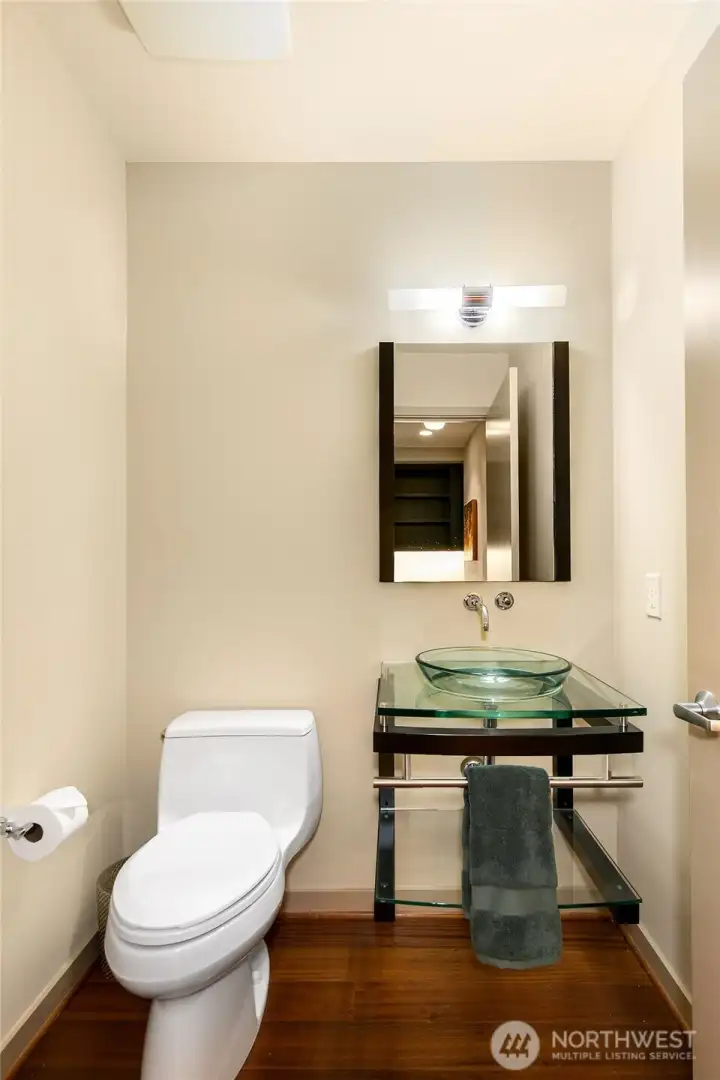 Powder room for guests; just another way this condo is elevated.