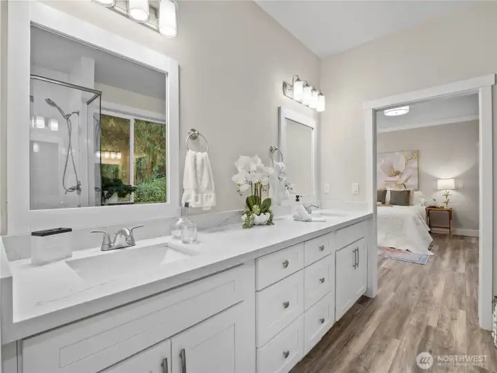 The large primary bathroom is a gorgeous place to get ready in the morning.