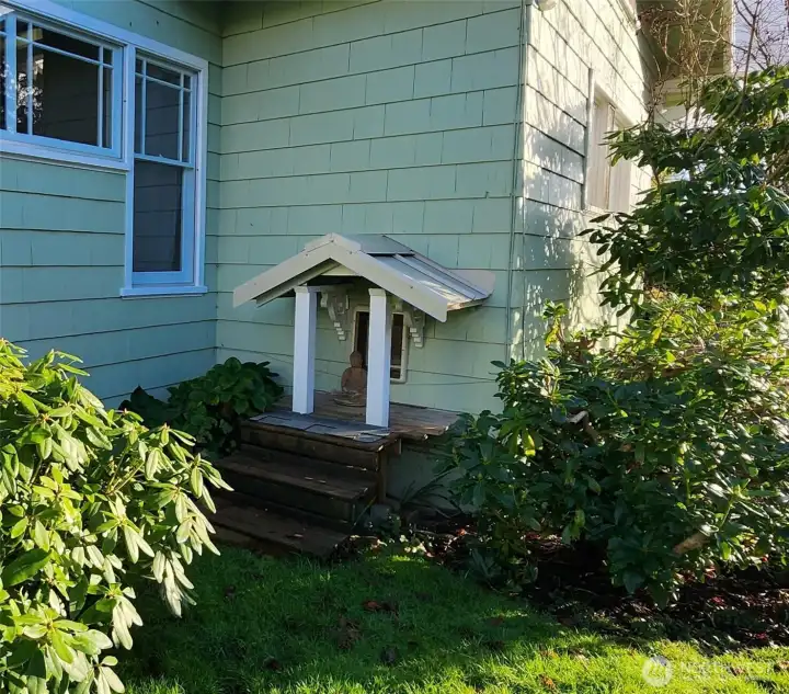 Pet door entrance from fully fenced yard