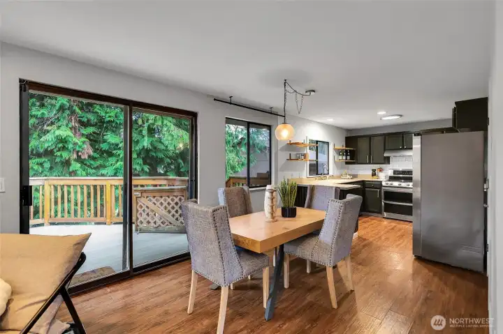 Large windows bring the outdoors in and fill the space with natural light.